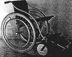 Wheelchair with wooden front wheels.