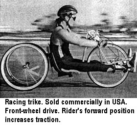 Racing trike. Sold commercially in USA. Front-wheel drive. Rider's forward position increases traction.