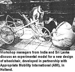 Workshop managers from India and Sri Lanka discuss an experimental model for a new design of wheelchair, developed in partnership with Appropriate Mobility International (AMI), in Holland.