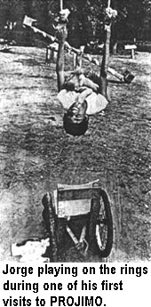 Jorge playing on the rings during one of his first visits to PROJIMO.